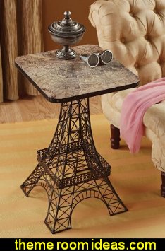 Set your cocktail glass atop a "view from above!" This Basil Street Gallery clever iconic table features a bird's eye view map of Paris as its tabletop and an artistically crafted portion of the famed Eiffel Tower as its sturdy base. Over two-feet tall, this global symbol is constructed of metal lattice with an aged finish to give it delightfully Parisian, street cafe charm.  paris bedroom decor