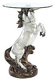 A golden-maned unicorn stands resplendent in the shy light of dawn; the very image of magic and might. Captivating statue base gives this fantasy table a legendary appeal! Clear glass top allows enjoyment from every angle